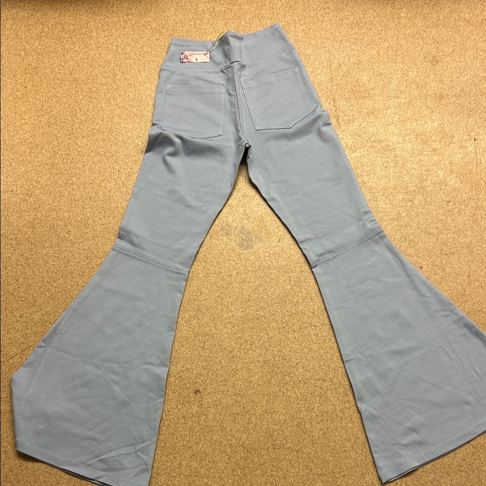 flare is 15” wide from top of stretch material  to bottom is 39”